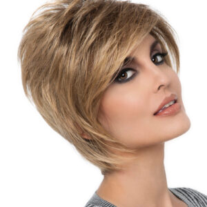 headshot of model wearing golden chin length wig