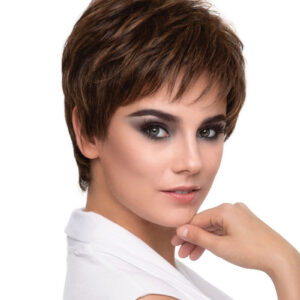 headshot of model wearing brown pixie style wig