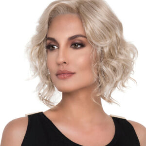 headshot of model wearing blonde chin length wig