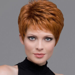 headshot of model wearing red pixie cut wig