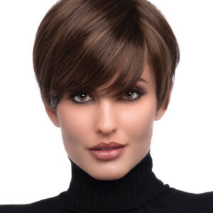 headshot of model wearing brown pixie style wig