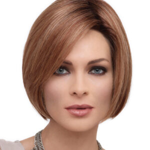 headshot of model wearing red chin length wig